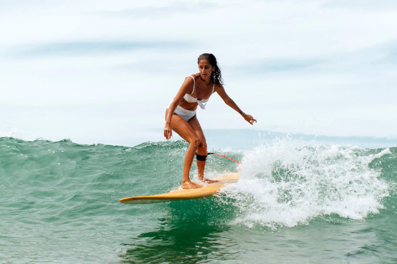 The Best Surfing Swimsuits and Surf Bikinis That'll Stand Up Against the  Waves