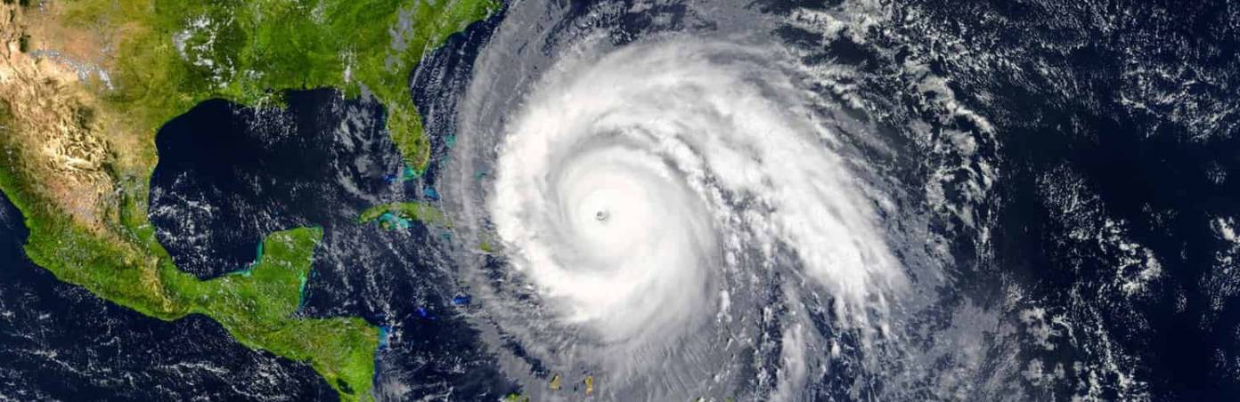 What are hurricanes, and why do they occur in a certain season